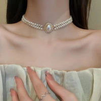 Collier perles Queen choker